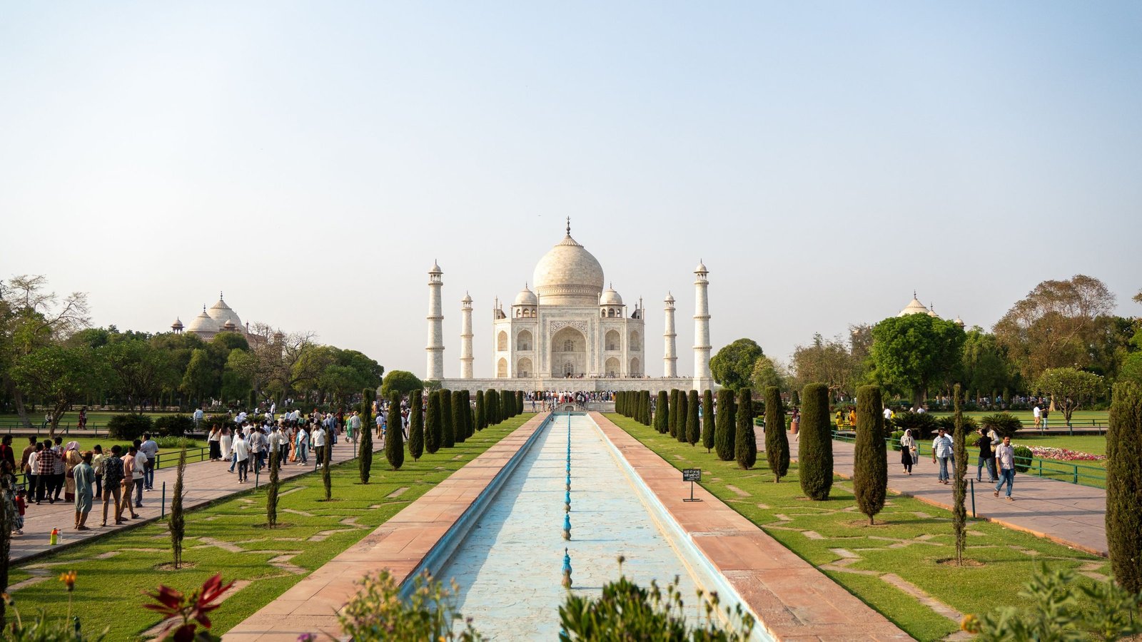 The Taj Mahal in Agra seen across its long water channel and gardens